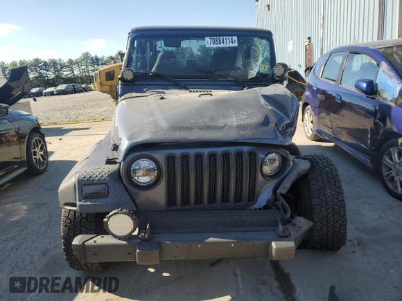 2002 Jeep Wrangler Sport with VIN 1J4FA49S72P715946, listed as a Copart auction lot 70884114 with 114,964 mi miles and Clean Title. Bid and sale history available at carsss.com. Image 5.