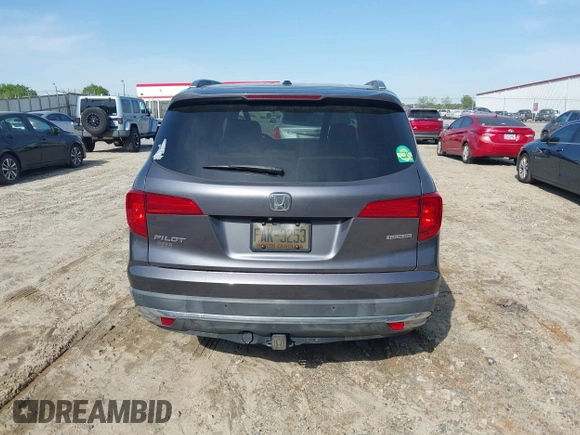 2017 Honda Pilot Touring with VIN 5FNYF5H9XHB046479, listed as a IAAI auction lot 41941449 with 162,554 mi miles. Bid and sale history available at carsss.com. Image 16.