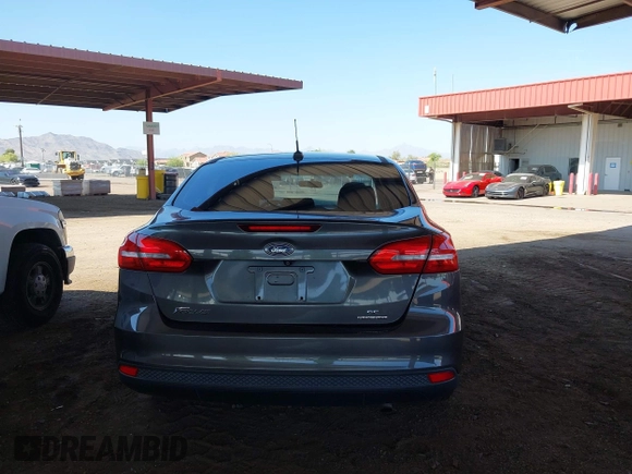 2015 Ford Focus SE z VIN 1FADP3F21FL210742, wystawiony jako IAAI lot #42418476 z przebiegiem 155 829 mil mil oraz . Historia ofert i sprzedaży dostępna na DreamBid. Obrazek 16.