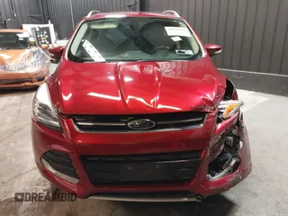 2014 Ford Escape Titanium with VIN 1FMCU9J9XEUD69589, listed as a IAAI auction lot 42031882 with 123,632 mi miles and . Bid and sale history available at DreamBid. Image 12.