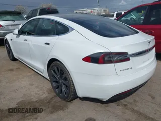 2018 Tesla Model S 75D with VIN 5YJSA1E23JF271465, listed as a IAAI auction lot 41911356 with 50,483 mi miles and . Bid and sale history available at DreamBid. Image 3.