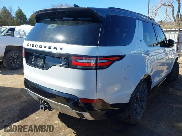 2017 Land Rover Discovery HSE Luxury z VIN SALRHBBV2HA037084, wystawiony jako IAAI lot #41669255 z przebiegiem 136 651 mil mil oraz . Historia ofert i sprzedaży dostępna na DreamBid. Obrazek 4.