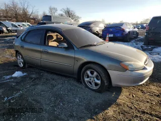 2002 Ford Taurus SES Standard with VIN 1FAFP55212A204077, listed as a Copart auction lot 87826465 with 101,651 mi miles and Salvage Title. Bid and sale history available at DreamBid. Image 4.