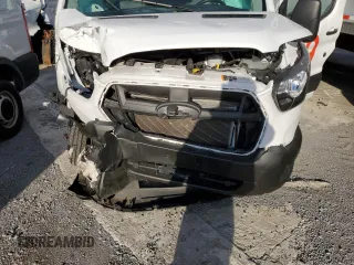 2023 Ford Transit Passenger XL with VIN 1FBVU4X89PKB82684, listed as a Copart auction lot 81326614 with 35,649 mi miles and Salvage title. Bid and sale history available at DreamBid. Image 12.