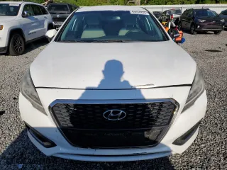2016 Hyundai Sonata Hybrid SE with VIN KMHE24L14GA022904, listed as a Copart auction lot 53036825 with 115,960 mi miles and Clean Title. Bid and sale history available at carsss.com. Image 5.
