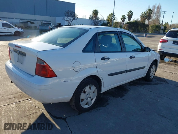 2007 Ford Focus S with VIN 1FAHP34N67W244433, listed as a IAAI auction lot 41539078 with 107,318 mi miles and . Bid and sale history available at DreamBid. Image 4.