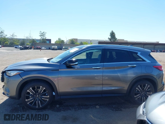 2021 Infiniti QX50 Luxe z VIN 3PCAJ5BA2MF111323, wystawiony jako IAAI lot #42218711 z przebiegiem 27 864 mil mil oraz . Historia ofert i sprzedaży dostępna na DreamBid. Obrazek 14.