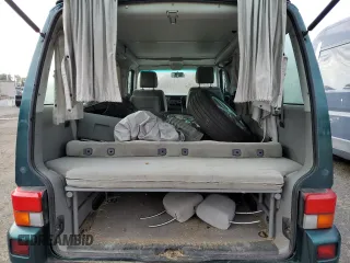 2002 Volkswagen EuroVan MV с VIN WV2NB47092H095600, выставлен на аукционе Copart как лот 50705065 с пробегом 223 049 миль миль и Чистый • Clean title. История ставок и продаж доступна на DreamBid. Изображение 10.