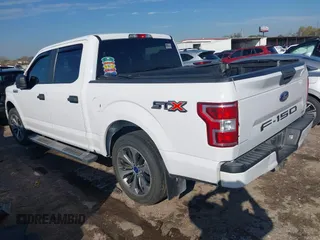 2019 Ford F-150 XL with VIN 1FTEW1CPXKKF00869, listed as a IAAI auction lot 41197442 with 77,487 mi miles and . Bid and sale history available at DreamBid. Image 3.