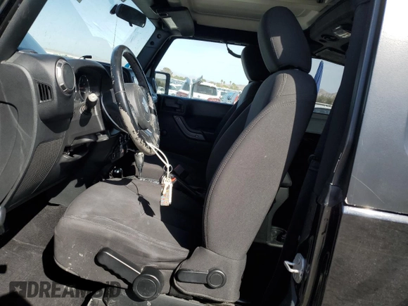 2017 Jeep Wrangler Sport with VIN 1C4AJWAGXHL715362, listed as a Copart auction lot 51262305 with 62,297 mi miles and Salvage Title. Bid and sale history available at DreamBid. Image 7.
