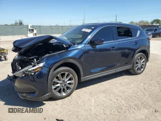 2021 Mazda CX-5 Signature with VIN JM3KFBEYXM0453766, listed as a Copart auction lot 45902795 with 26,066 mi miles and Salvage Title. Bid and sale history available at carsss.com. Image 1.
