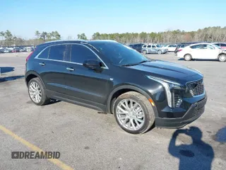 2021 Cadillac XT4 FWD Luxury with VIN 1GYAZAR46MF074767, listed as a IAAI auction lot 41652091 with 46,631 mi miles and . Bid and sale history available at DreamBid. Image 1.