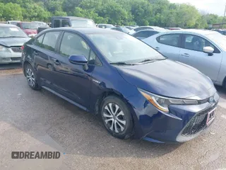 2020 Toyota Corolla Hybrid LE with VIN JTDEBRBE4LJ010266, listed as a IAAI auction lot 42074390 with 267,295 mi miles. Bid and sale history available at carsss.com. Image 1.