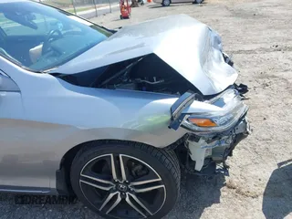2016 Honda Accord Touring with VIN 1HGCT2B03GA000691, listed as a IAAI auction lot 42009414 with 70,306 mi miles and . Bid and sale history available at DreamBid. Image 21.