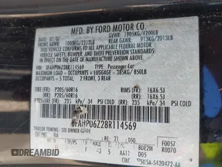 2008 Ford Fusion S with VIN 3FAHP06Z28R114569, listed as a IAAI auction lot 42035714 with 139,656 mi miles. Bid and sale history available at carsss.com. Image 9.