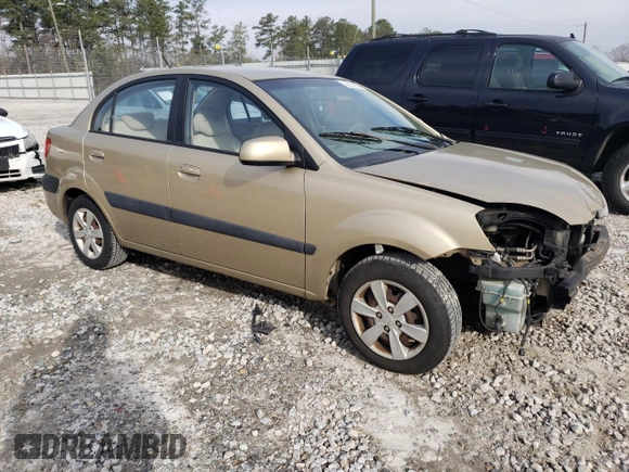 2009 Kia Rio LX with VIN KNADE223296470687, listed as a Copart auction lot 48385925 with 176,400 mi miles and Salvage Title. Bid and sale history available at DreamBid. Image 4.