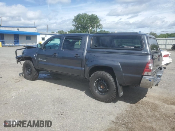 2014 Toyota Tacoma with VIN 3TMLU4EN2EM163797, listed as a Copart auction lot 61078805 with 130,748 mi miles and Salvage title. Bid and sale history available at DreamBid. Image 2.