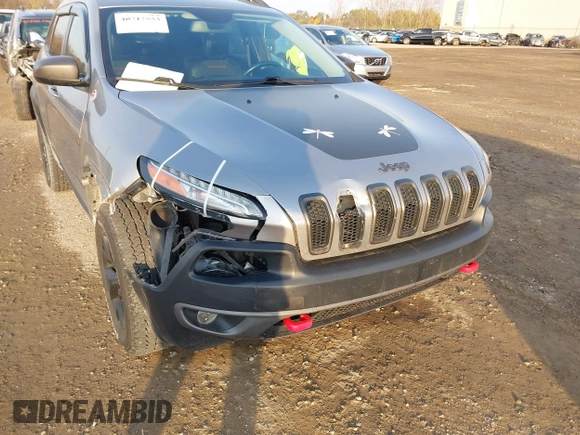 2015 Jeep Cherokee Trailhawk z VIN 1C4PJMBS2FW728961, wystawiony jako IAAI lot #40712830 z przebiegiem 79 299 mil mil oraz . Historia ofert i sprzedaży dostępna na DreamBid. Obrazek 6.