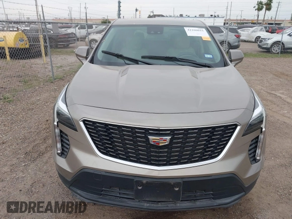 2023 Cadillac XT4 FWD Luxury z VIN 1GYAZAR43PF152992, wystawiony jako IAAI lot #42160015 z przebiegiem 29 466 mil mil oraz . Historia ofert i sprzedaży dostępna na DreamBid. Obrazek 6.