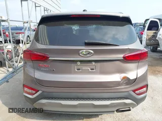2020 Hyundai Santa Fe SE with VIN 5NMS23AD6LH220012, listed as a IAAI auction lot 42317046 with 141,055 mi miles and . Bid and sale history available at DreamBid. Image 16.
