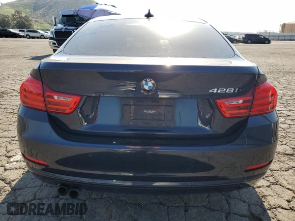 2016 BMW 4 Series 428i z VIN WBA4A9C59GG696298, wystawiony jako Copart lot #52348325 z przebiegiem 87 319 mil mil oraz Szkoda całkowita • Salvage title. Historia ofert i sprzedaży dostępna na DreamBid. Obrazek 6.
