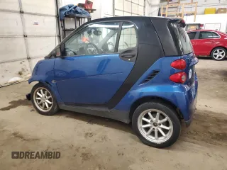 2009 Smart fortwo Pure z VIN WMEEJ31X99K209790, wystawiony jako Copart lot #51102685 z przebiegiem 30 389 mil mil oraz Szkody całkowita. Historia ofert i sprzedaży dostępna na DreamBid. Obrazek 2.