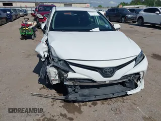 2019 Toyota Camry LE with VIN 4T1B11HK4KU180995, listed as a IAAI auction lot 42088737 with 133,813 mi miles and . Bid and sale history available at DreamBid. Image 6.