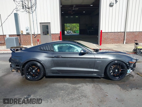 2018 Ford Mustang GT z VIN 1FA6P8CF3J5182601, wystawiony jako IAAI lot #41661225 z przebiegiem 67 898 mil mil oraz . Historia ofert i sprzedaży dostępna na DreamBid. Obrazek 14.