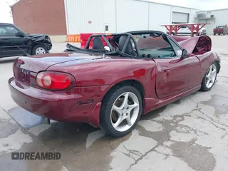 2003 Mazda MX-5 Miata Cloth with VIN JM1NB353130304852, listed as a IAAI auction lot 42145498 with Not provided miles and . Bid and sale history available at DreamBid. Image 4.