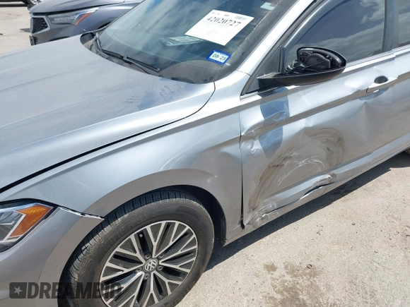 2021 Volkswagen Jetta S z VIN 3VWC57BU9MM015930, wystawiony jako IAAI lot #42020727 z przebiegiem 67 982 mil mil oraz . Historia ofert i sprzedaży dostępna na DreamBid. Obrazek 6.