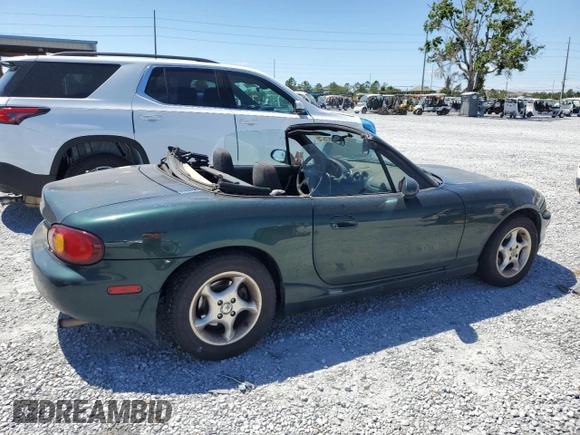 1999 Mazda MX-5 Miata with VIN JM1NB3530X0118452, listed as a Copart auction lot 53337575 with 150,574 mi miles and Clean title. Bid and sale history available at DreamBid. Image 3.