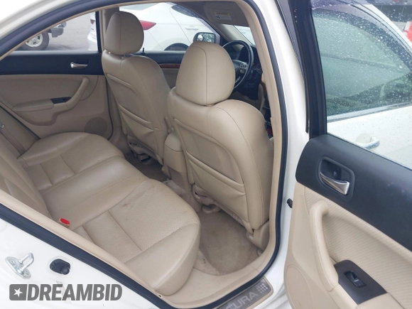 2007 Acura TSX with VIN JH4CL96817C004877, listed as a IAAI auction lot 42464309 with 299,459 mi miles and . Bid and sale history available at DreamBid. Image 8.