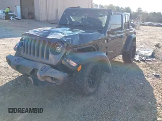 2019 Jeep Wrangler Unlimited Sport S with VIN 1C4HJXDGXKW500313, listed as a IAAI auction lot 41022680 with 82,864 mi miles and . Bid and sale history available at DreamBid. Image 17.