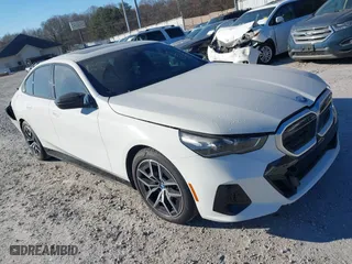 2024 BMW i5 M60 with VIN WBY43FK01RCP34925, listed as a IAAI auction lot 41100557 with 27,814 mi miles. Bid and sale history available at carsss.com. Image 1.