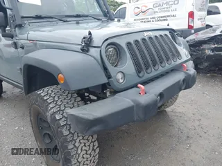 2015 Jeep Wrangler Unlimited Sport with VIN 1C4HJWDG1FL635620, listed as a IAAI auction lot 42396137 with 87,352 mi miles and . Bid and sale history available at DreamBid. Image 17.