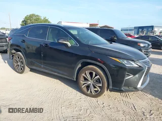 2016 Lexus RX 350 z VIN 2T2ZZMCAXGC007512, wystawiony jako IAAI lot #42352662 z przebiegiem 107 586 mil mil oraz . Historia ofert i sprzedaży dostępna na DreamBid. Obrazek 1.