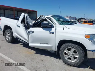 2014 Toyota Tundra 4WD Truck SR5 with VIN 5TFDW5F1XEX390763, listed as a IAAI auction lot 41973864 with 117,369 mi miles. Bid and sale history available at carsss.com. Image 1.