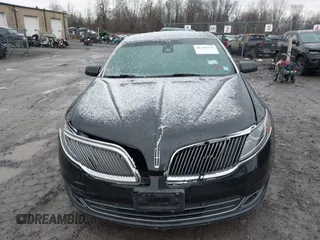2014 Lincoln MKS with VIN 1LNHL9EK3EG601471, listed as a IAAI auction lot 41142126 with 110,432 mi miles. Bid and sale history available at carsss.com. Image 13.