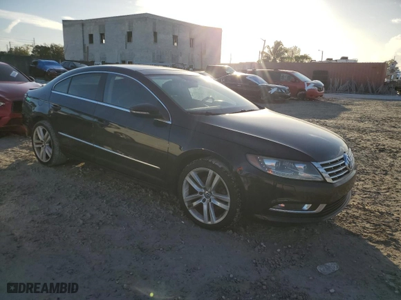 2013 Volkswagen CC Lux with VIN WVWRN7AN0DE519991, listed as a Copart auction lot 84493504 with 116,969 mi miles and Salvage Title. Bid and sale history available at carsss.com. Image 4.