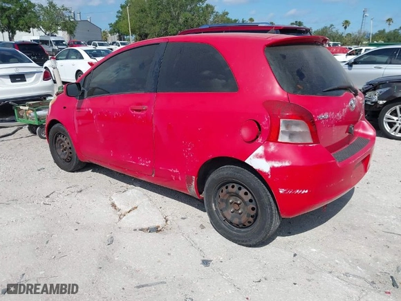2007 Toyota Yaris with VIN JTDJT923375055871, listed as a IAAI auction lot 42038371 with 115,209 mi miles. Bid and sale history available at carsss.com. Image 3.