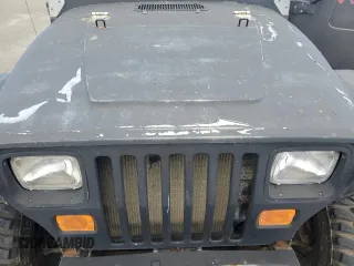 1990 Jeep Wrangler with VIN 2J4FY29T5LJ537896, listed as a Copart auction lot 57021295 with 143,753 mi miles and Clean title. Bid and sale history available at DreamBid. Image 11.