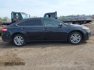 2013 Toyota Avalon XLE with VIN 4T1BK1EB3DU051683, listed as a IAAI auction lot 42118150 with 177,504 mi miles and . Bid and sale history available at DreamBid. Image 13.