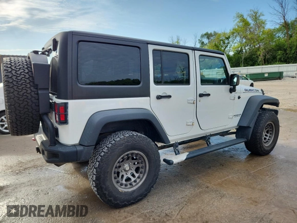 2015 Jeep Wrangler Unlimited Rubicon with VIN 1C4BJWFGXFL518301, listed as a Copart auction lot 61910775 with 153,945 mi miles and Clean title. Bid and sale history available at DreamBid. Image 3.
