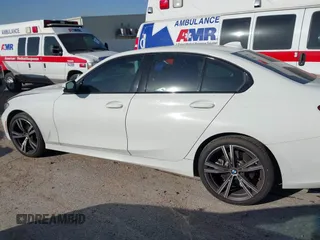 2022 BMW 3 Series 330i z VIN 3MW5R1J01N8C72194, wystawiony jako IAAI lot #41833596 z przebiegiem 24 296 mil mil oraz . Historia ofert i sprzedaży dostępna na DreamBid. Obrazek 14.