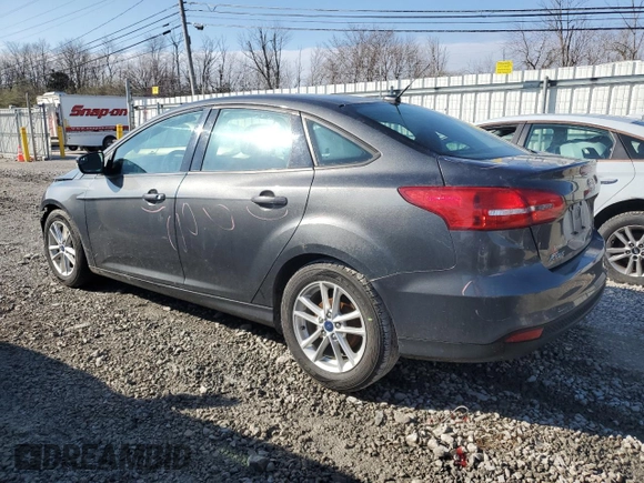 2016 Ford Focus SE with VIN 1FADP3F23GL384944, listed as a Copart auction lot 49876395 with 74,087 mi miles and Salvage title. Bid and sale history available at DreamBid. Image 2.