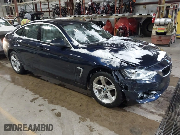 2015 BMW 4 Series 428i xDrive with VIN WBA4A7C57FD414955, listed as a IAAI auction lot 41609214 with 69,125 mi miles and . Bid and sale history available at DreamBid. Image 1.