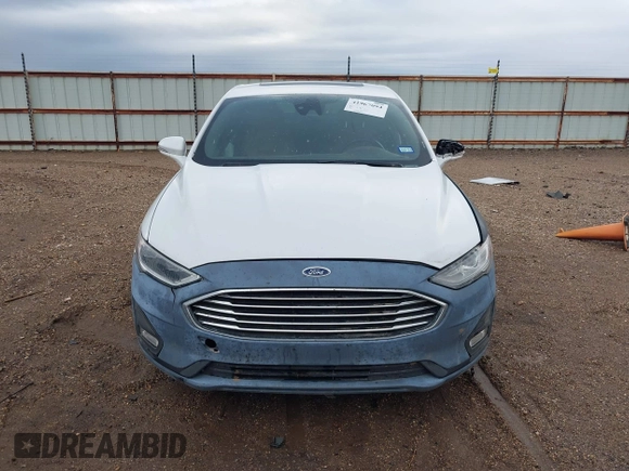 2019 Ford Fusion Titanium with VIN 3FA6P0D93KR138574, listed as a IAAI auction lot 41967094 with 118,297 mi miles. Bid and sale history available at carsss.com. Image 12.