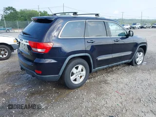 2011 Jeep Grand Cherokee Laredo with VIN 1J4RR4GG5BC622628, listed as a IAAI auction lot 42402893 with 163,731 mi miles and . Bid and sale history available at DreamBid. Image 4.