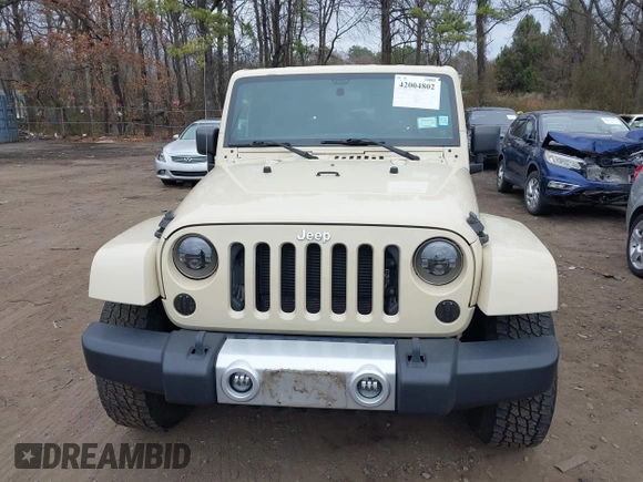 2012 Jeep Wrangler Arctic с VIN 1C4AJWBG1CL103607, выставлен на аукционе IAAI как лот 42004802 с пробегом 72 030 миль миль и . История ставок и продаж доступна на DreamBid. Изображение 12.