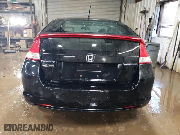 2011 Honda Insight LX z VIN JHMZE2H54BS009715, wystawiony jako Copart lot #48790825 z przebiegiem 219 867 mil mil oraz Szkoda całkowita • Salvage title. Historia ofert i sprzedaży dostępna na DreamBid. Obrazek 6.